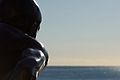Bronze lifeguard statue by ocean.jpg