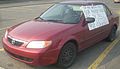 '01 Mazda Protegé With Sign -- Front.jpg