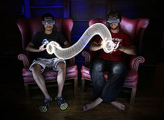 Long-exposure portrait of 2 people sharing 3D computational lightpainting.jpg
